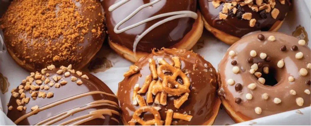A box of glazed Chanukah donuts